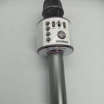 BONAOK wireless Bluetooth karaoke microphone.